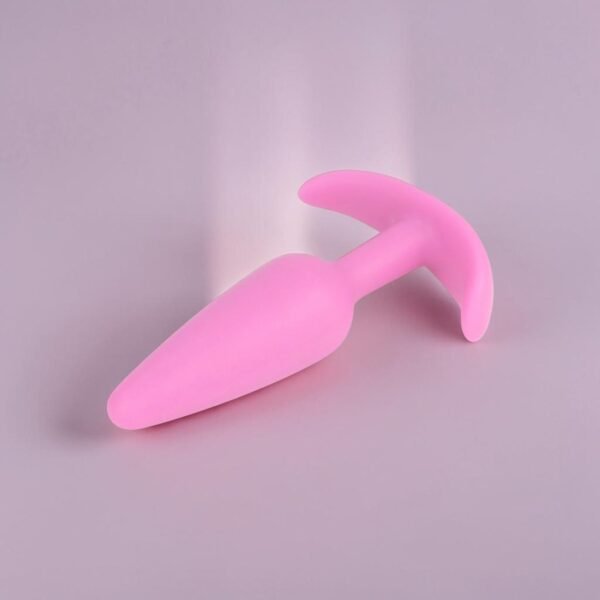 Plug anal dilatador base ancla flexible
